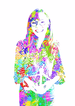 Pop-Art Frau mit Brille in buntem Farbexplosions-Outfit stehend posierend