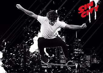 Pop-Art Skateboarder springt vor Großstadt-Skyline im Sin-City-Stil